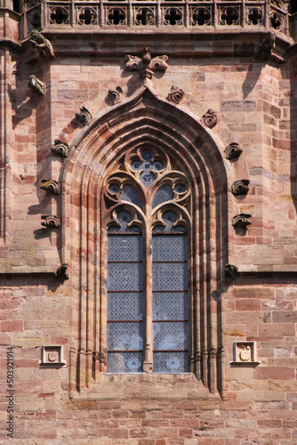 Pointed ogive arch with gothic window at Rodez cathedral in Aveyron, France