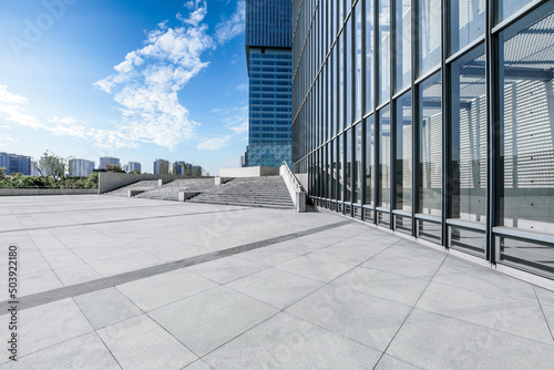 Empty square floor and city skyline with modern commercial buildings in Shanghai, China.