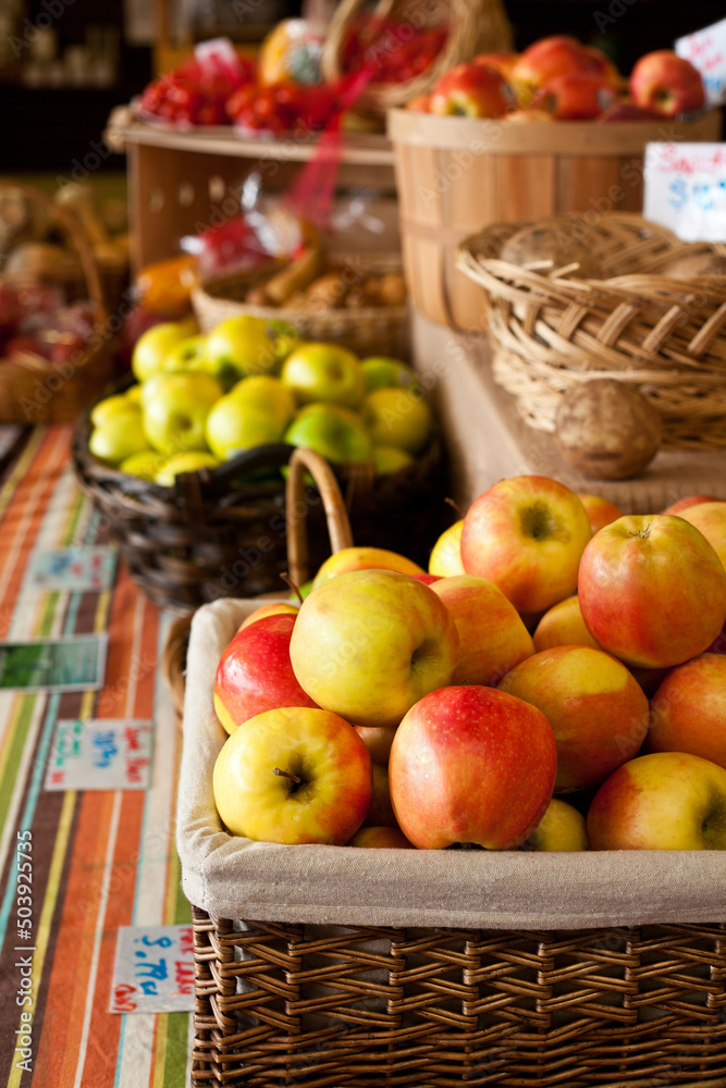 Local Farmers Market Coop Grocery Store Display of Apples with Colorful Fresh Organic Fruit and Vegetables Produce in Woven Baskets Local Farmers Market Coop Grocery Store Display of Apples with Colorful Fresh Organic Fruit and Vegetables Produce in Woven Baskets