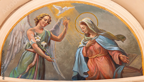 BARI, ITALY - MARCH 3, 2022: The fresco of Annunciation in the temple in the church Chiesa San Ferdinando by Nicola Colonna (1862 -1948). photo