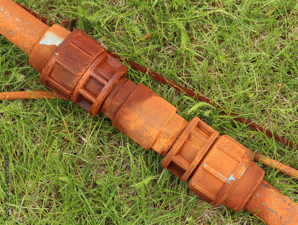 A polyethylene pipe with a check valve is retrieved from a well with a