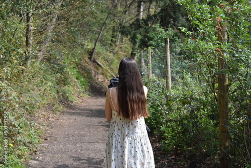 Women walking outdoors in the Welsh forests of Tintern, Wales.