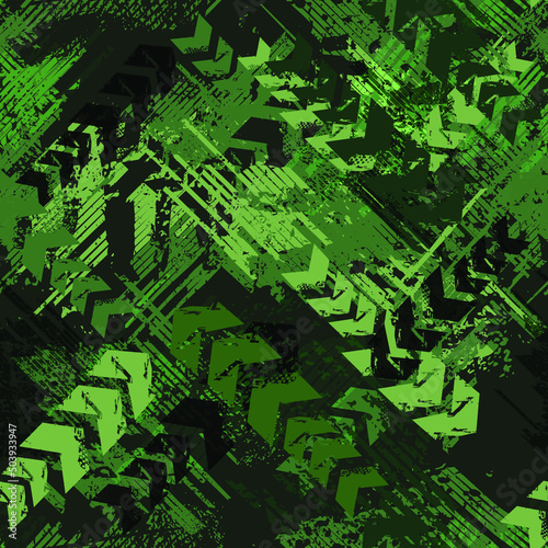 Green Grunge arrow seamless pattern. Endless stripe textured print for sport textile, wrapping paper. Camouflage geometric endless ornament