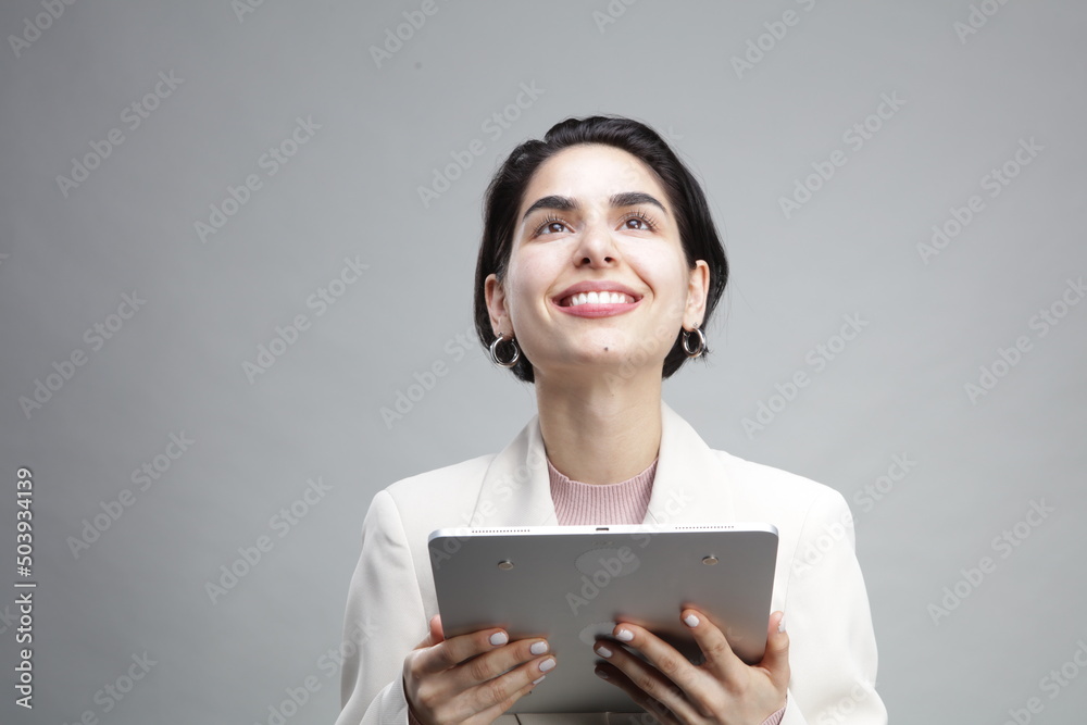 Young businesswoman using tablet Young businesswoman using tablet