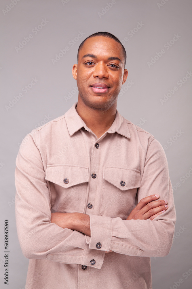Portrait of smiling man in beige shirt Portrait of smiling man in beige shirt