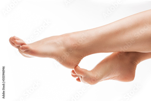 Female feet with smooth soft skin after hair removal treatment