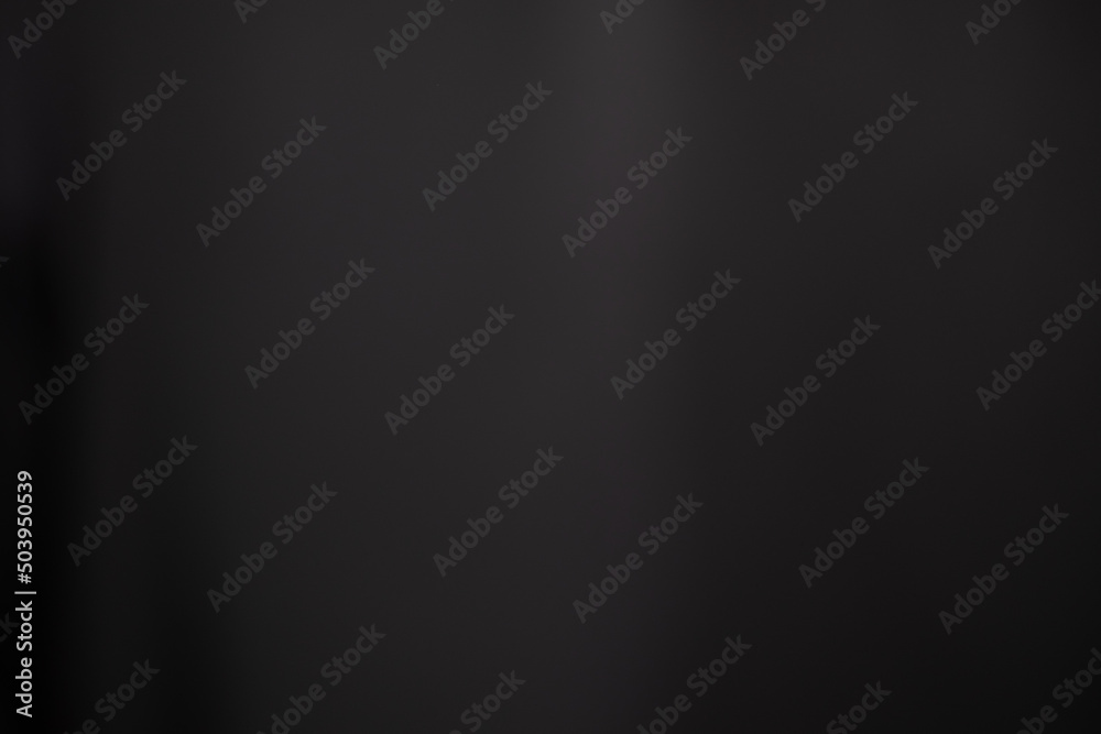 Dark black and gray blurred background has a little abstract light. soft background for wallpaper,design,graphic and presentation - obrazy, fototapety, plakaty 