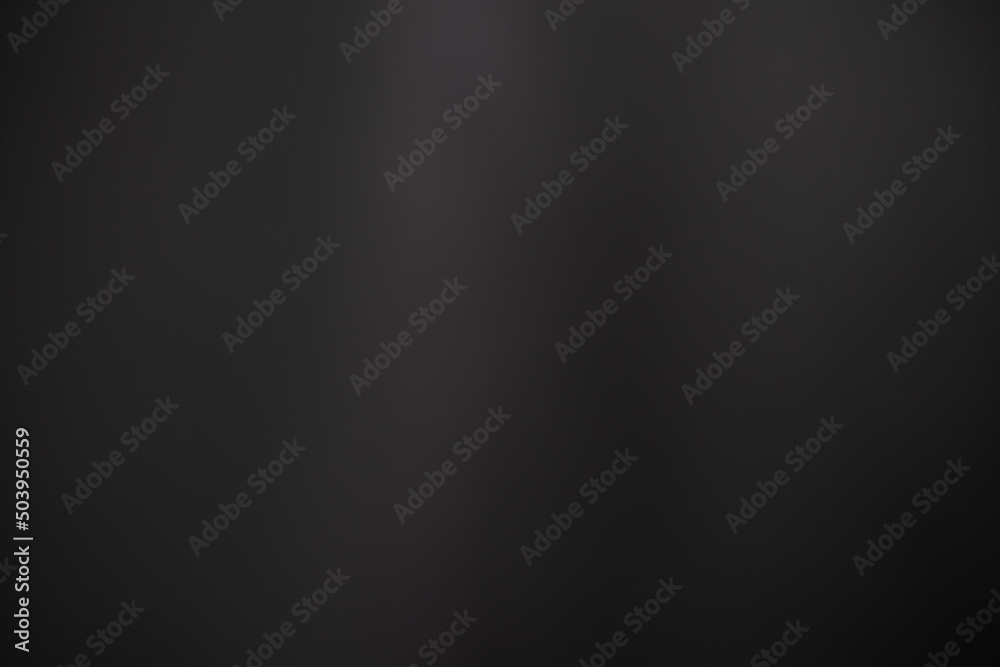 Dark black and gray blurred background has a little abstract light. soft background for wallpaper,design,graphic and presentation Dark black and gray blurred background has a little abstract light. soft background for wallpaper,design,graphic and presentation