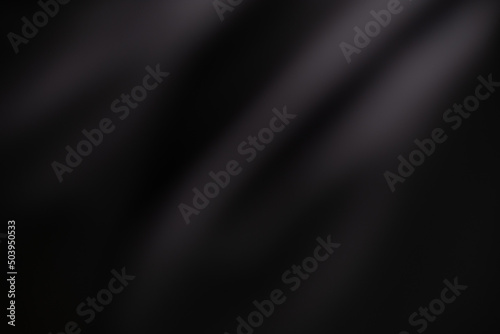 Dark black and gray blurred background has a little abstract light. soft background for wallpaper,design,graphic and presentation