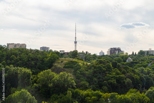 Kyiv, Ukraine – July 08, 2017: A beautiful panorama of Podil area. Aerial view on residential and industrial areas. A lot of buildings of different architectural style. Historical area, Dnipro river.