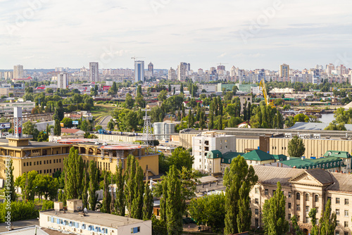 Kyiv, Ukraine – July 08, 2017: A beautiful panorama of Podil area. Aerial view on residential and industrial areas. A lot of buildings of different architectural style. Historical area, Dnipro river.