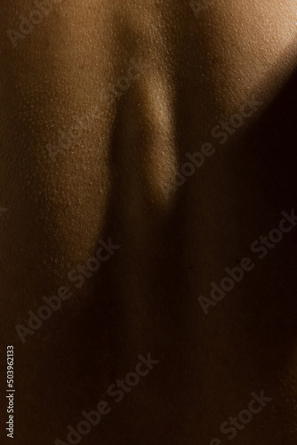 Details. Close up part of woman's body. Photo of human skin. Beauty, art, skincare, bodycare, healthcare, hygiene and medicine concept.
