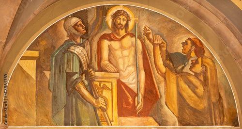 BARCELONA  SPAIN - MARCH 3  2020  The fresco Jesus before Pilate in the church Santuario Nuestra Senora del Sagrado Corazon by Francesc Labarta  1960 .