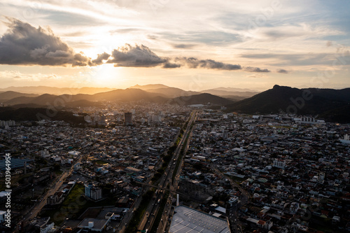 Aerial view of BR101 crossing Balneário Camboriú during sunset, Brazil.