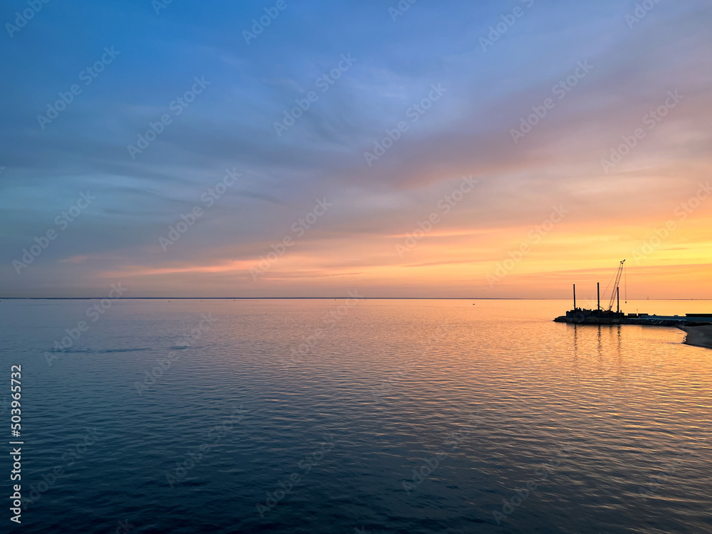 Wonderful peaceful sunset at the sea, seascape background, tender and natural colors Wonderful peaceful sunset at the sea, seascape background, tender and natural colors