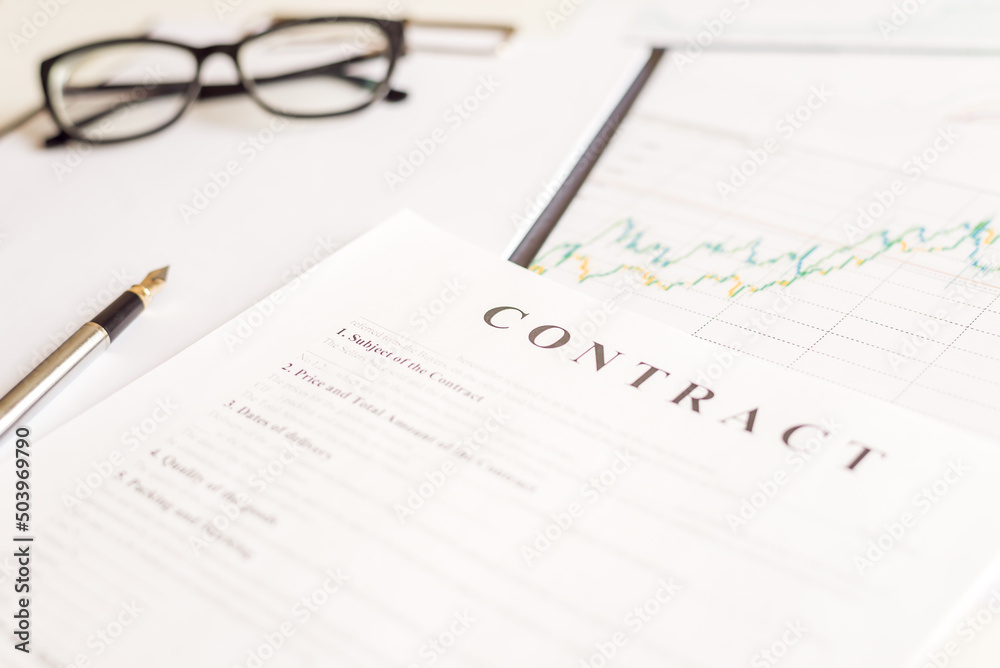 White table with business document contract form paper and empty space to sign authorized signature, copy space available for text White table with business document contract form paper and empty space to sign authorized signature, copy space available for text