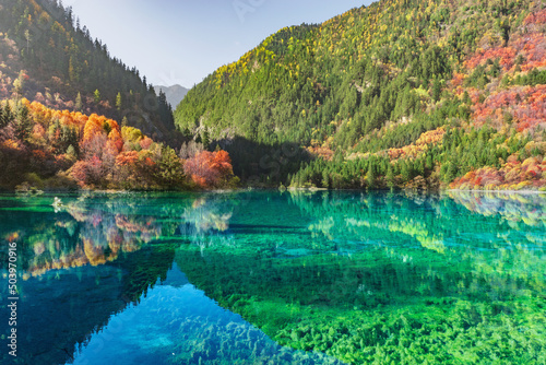 Five Flower Lake at autumn time. Jiuzhaigou nature reserve. Jiuzhai Valley National Park. photo