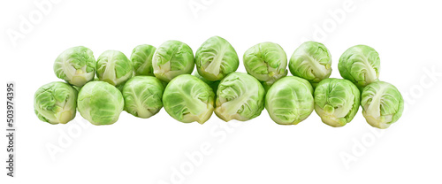 pile of organic brussels sprouts isolated on white background.