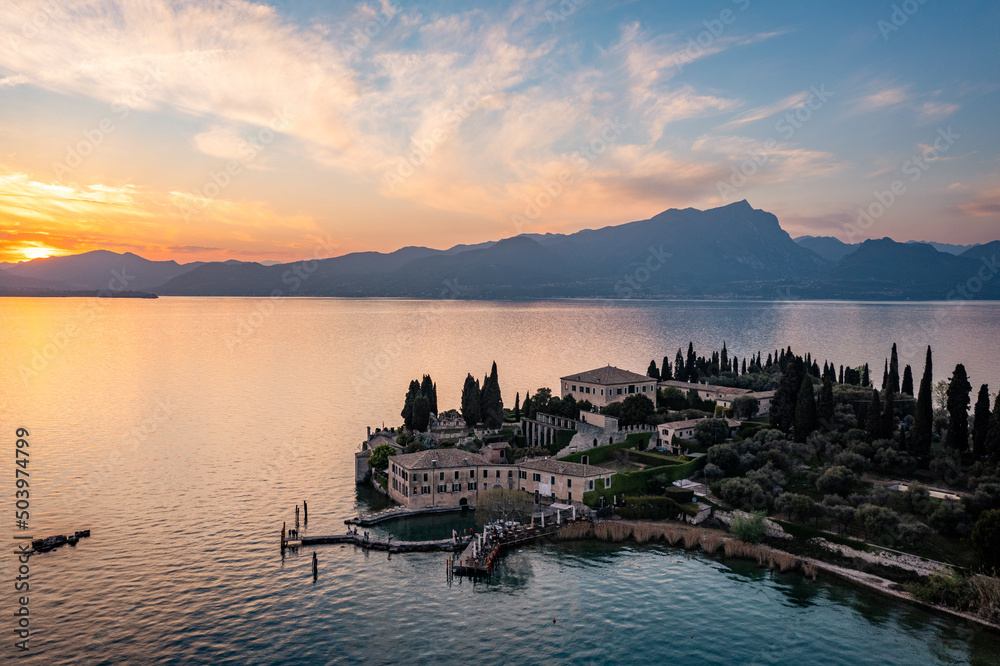 Punta San Vigilio, Garda Lake at sunset, aerial view. Italy