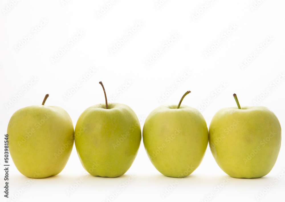 Fresh green apples isolated on white background. Environmentally friendly product. Fresh green apples isolated on white background. Environmentally friendly product.