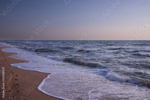 Panorama of a beautiful beach with golden sand and turquoise blue water. Summer beach  vacation concept. Sea wave on the sandy beach.Copy space