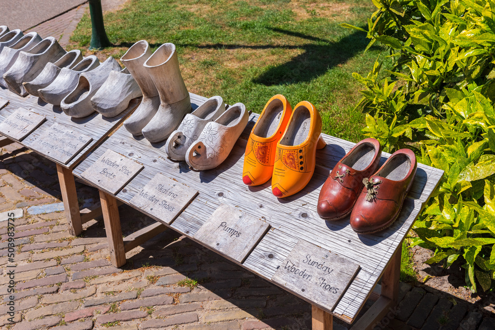 Clogs on display at the Keukenhof Gardens complex in Lisse, South Holland, The Netherlands on spring day. Keukenhof is one of the world's largest flower gardens, open annually from March to May.