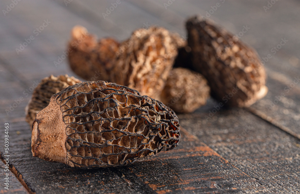 Morel Mushrooms on a Wooden Table Morel Mushrooms on a Wooden Table