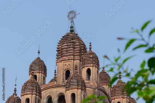 Spears and Terracotta decorations at the top of famous Hindu temple called Krishna Chandra Temple, at Kalna, West Bengal, India. photo