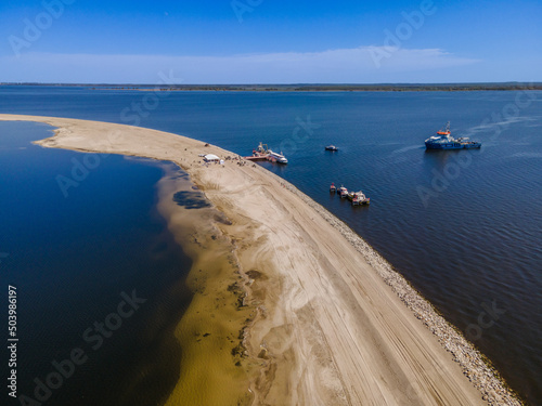 Fototapeta Naklejka Na Ścianę i Meble -  Zalew Szczecinski, Poland May 9, 2022 Island W28, an artificial island in the lagoon