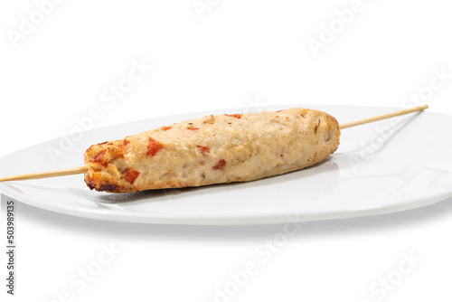Lulya Kebab Kurin with specialmies, apertite photograph, on a white plate on a clean white background.