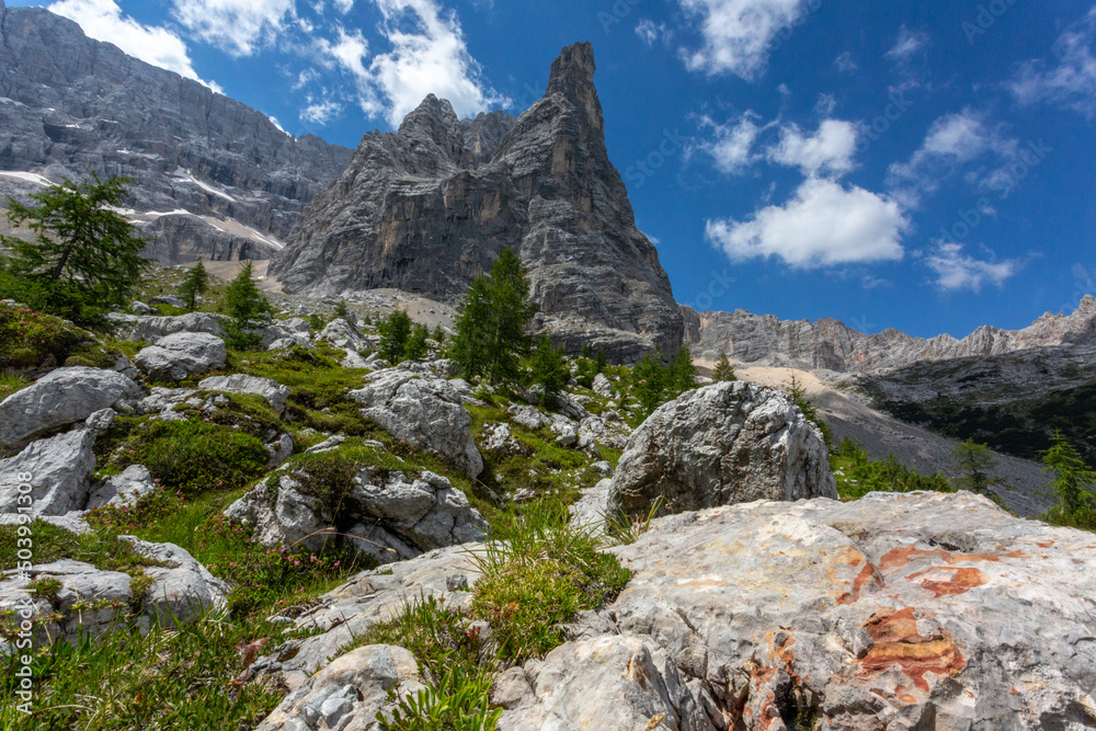 Mountain above Lake Sorapis, azure blue lake in the dolomites, Italy