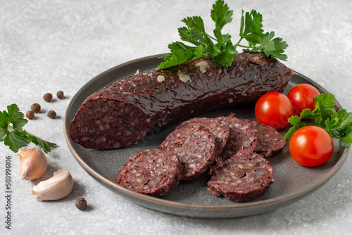 Delicious homemade blood sausage with garlic and spices photo