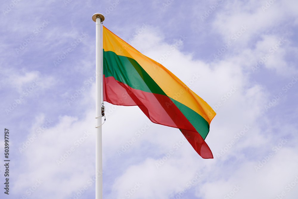 flag Lithuania Lithuanian National state flag on wind mat with blue cloud sky flag Lithuania Lithuanian National state flag on wind mat with blue cloud sky