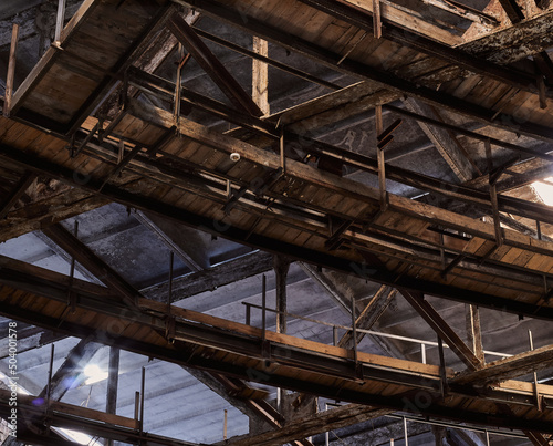 Metal wooden ceiling construction in an abandoned building. 