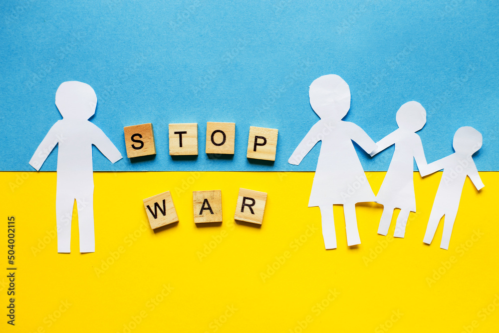 paper cut divided family on the background of the ukrainian flag. stop war concept paper cut divided family on the background of the ukrainian flag. stop war concept