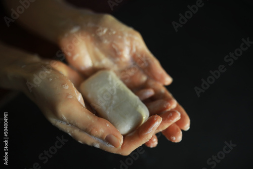 Bare hands in soapy foam. Hand hygiene. Wash your hands. Disinfection with soap protection against viruses.
