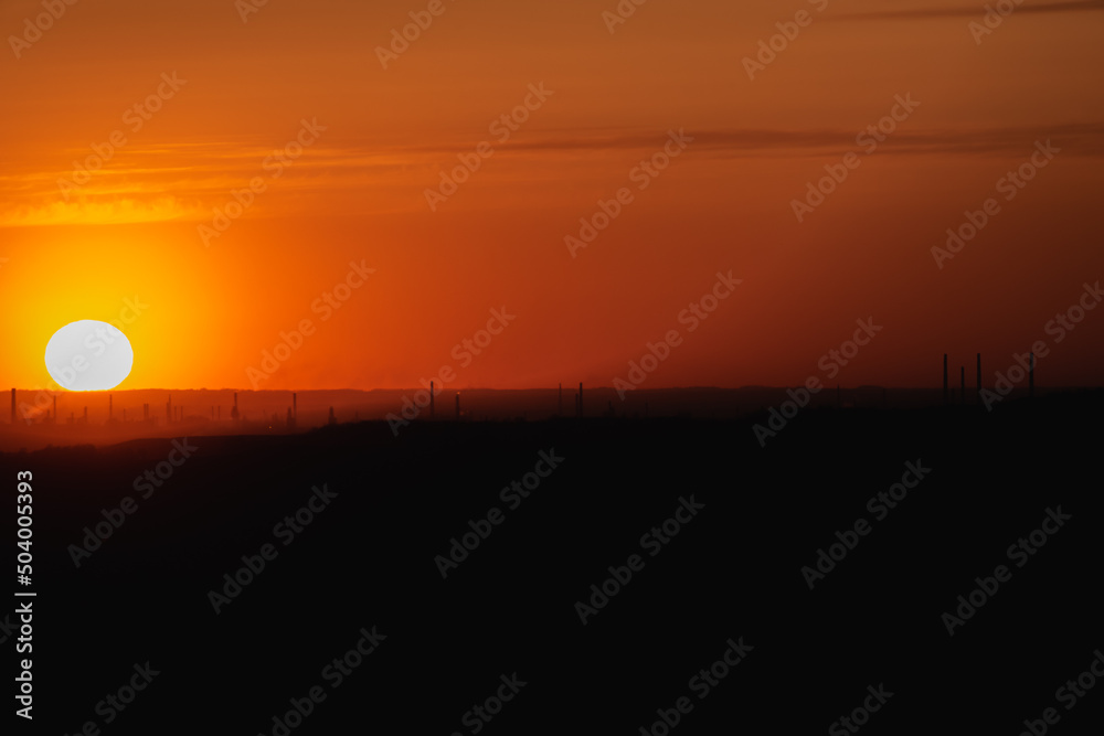 Sunset outside the city, big sun. Sunset outside the city, big sun.