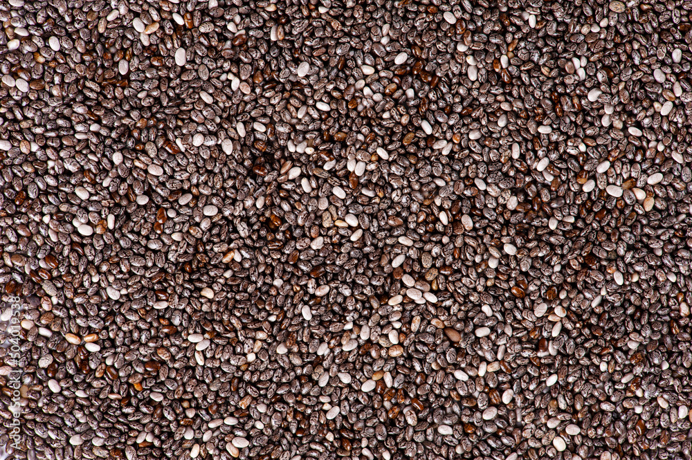 Chia seeds background photographed very closely. Chia seeds background photographed very closely.