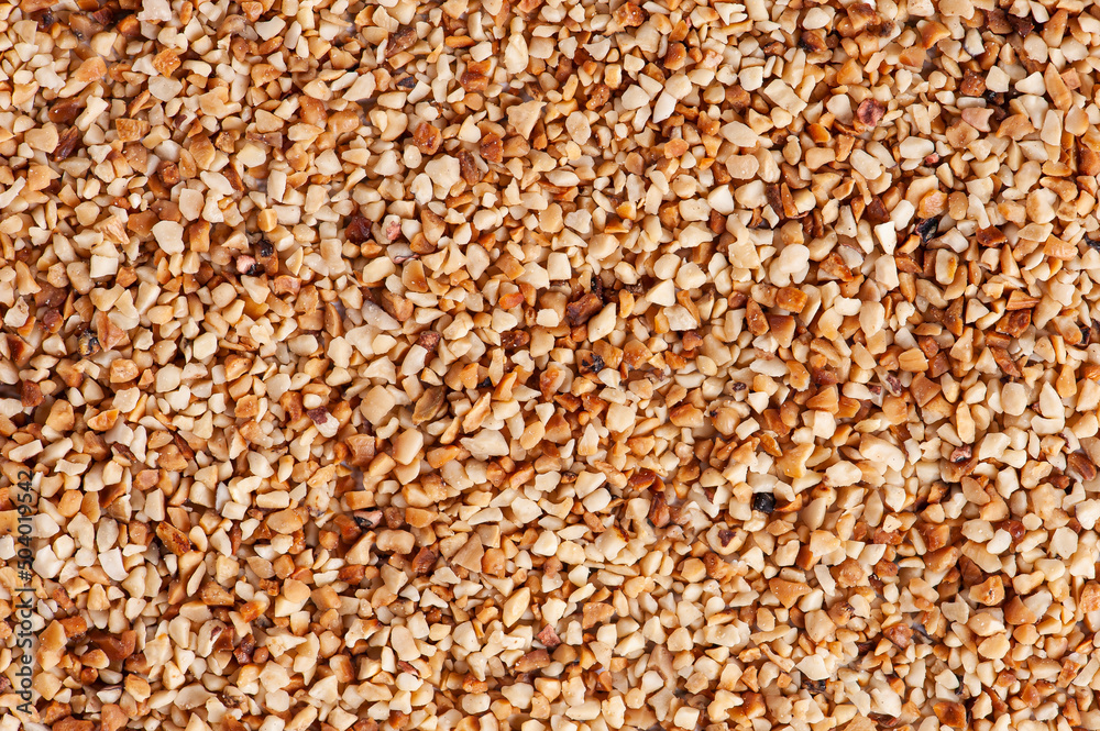 Ground peanuts or chestnuts background. Copy space. Ground peanuts or chestnuts background. Copy space.