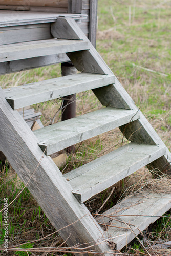 wooden staircase on the veranda of the house