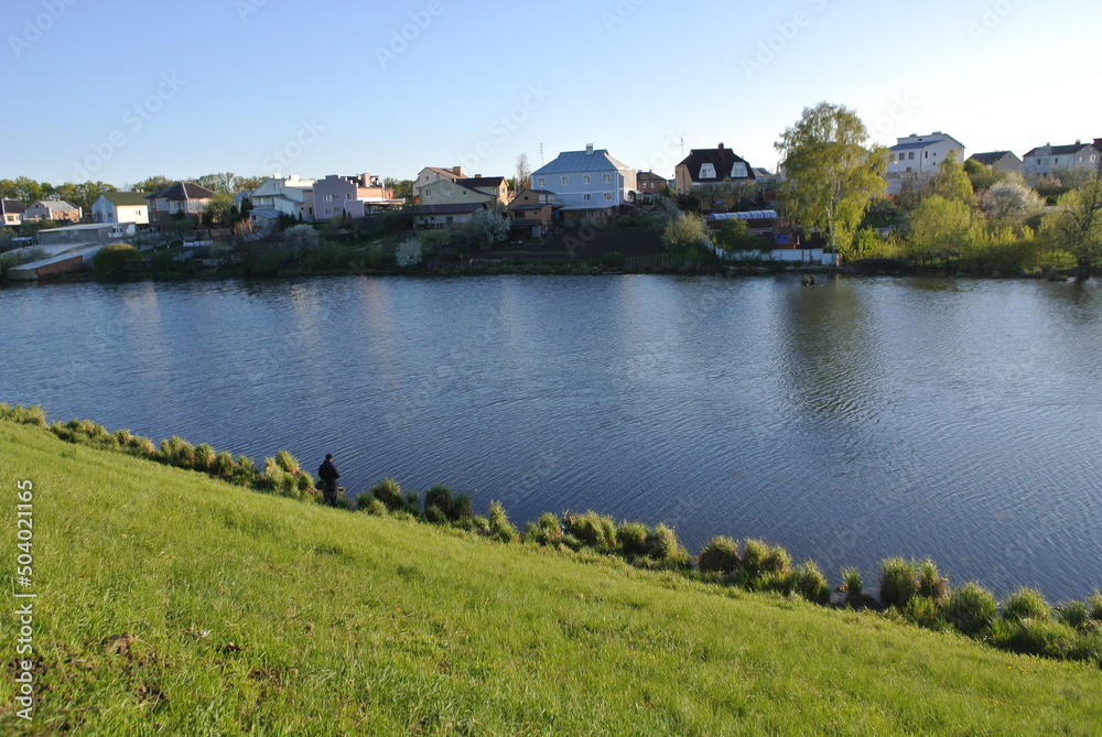 landscape with river and houses