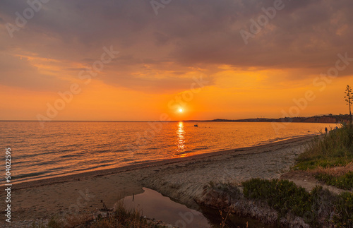 Beautiful view of red sunset in Mediterranean Sea. Greece.