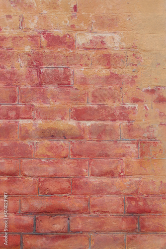 Red brick wall. Ancient brickwork. Construction work concept. Barrier concept. The concept of security systems. Can be used as a poster or background for design.