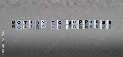 motion to suppress word or concept represented by black and white letter cubes on a grey horizon background stretching to infinity