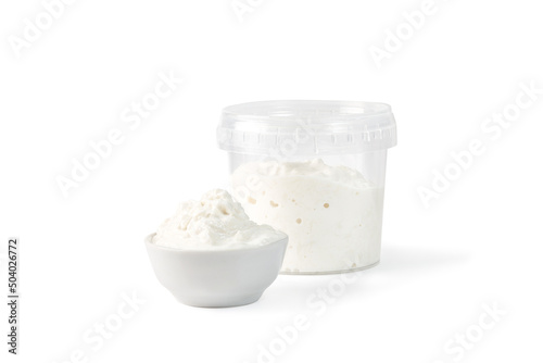 Stracciatella cheese isolated on white. Italian Stretched curd cheese product Stracciatella in bowl and plastic jar.