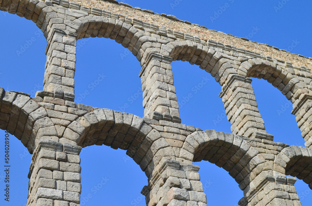 Close-up image of the Geometric Pattern of the Roman Aqueduct of Segovia in the Spanish Plaza De Artilleria.