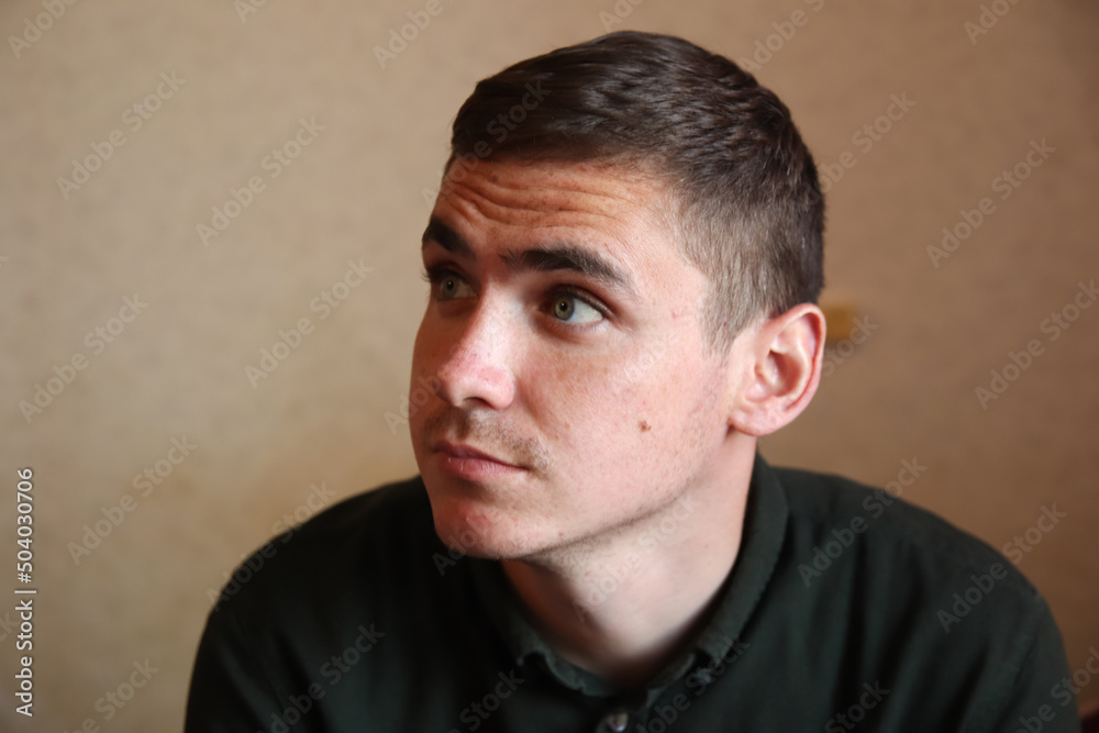 Defocus charming thoughtful, charismatic man trying think up solution. Creative handsome brunet boyfriend grey eyes raising eyebrows looking at upper left corner, thinking. Out of focus Defocus charming thoughtful, charismatic man trying think up solution. Creative handsome brunet boyfriend grey eyes raising eyebrows looking at upper left corner, thinking. Out of focus