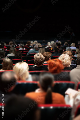 theater audience seated before performance