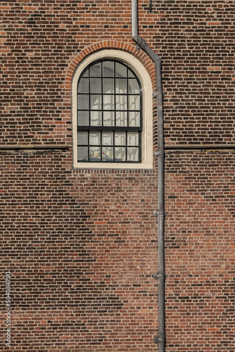 Amsterdamse Poort (or Spaarnwouder Poort, 1355), old city gate of Haarlem. The brick gate with towers is at the end of old route from Amsterdam to Haarlem. Haarlem, North Holland, the Netherlands.