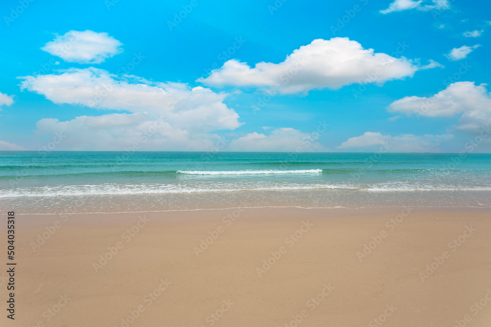 tropical paradise beach with white sand and blue sky and cloud background.